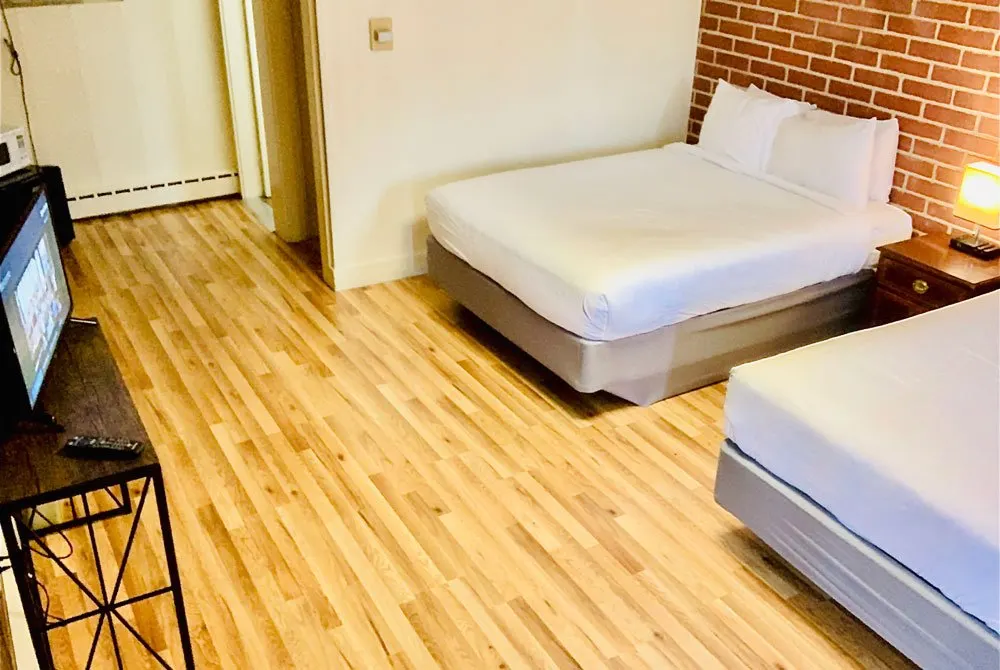 Deluxe Double Room at Red Fox Inn — two double beds, sleeps four, classic motor lodge interior
